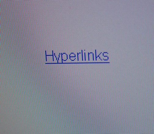An close-up image of the word 'hyperlinks' on a computer screen. the word is blue and underlined.