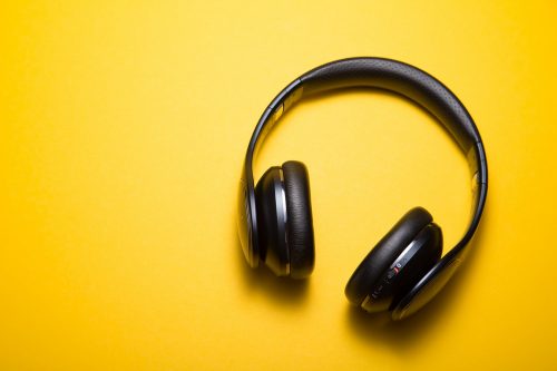 Headphones on a bright yellow background