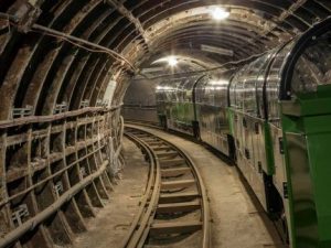 Photo of the underground mail rail tunnel and train