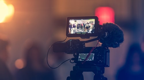 A video camera, set up and recording